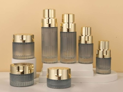Smoky Grey Ribbed Glass with Gold Pump Cap Skincare Packaging Set | 120/100/40/30ml Bottles & 100/50/30g Jars for Premium Lines 1