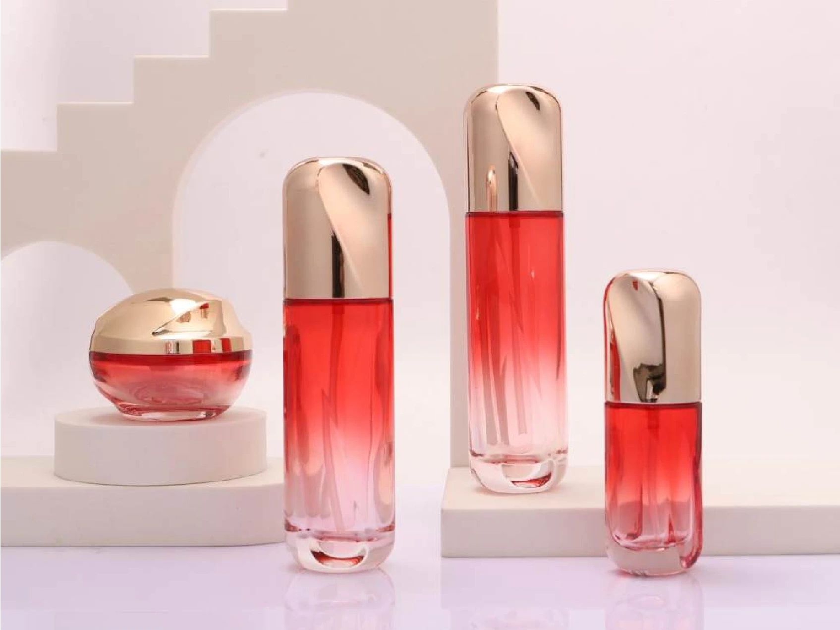 Red-Pink Gradient Skincare Packaging Set with Rose Gold Capsule-Style Lids | 120/100/40ml Bottles & 50g Jar for Revitalizing Lines 1