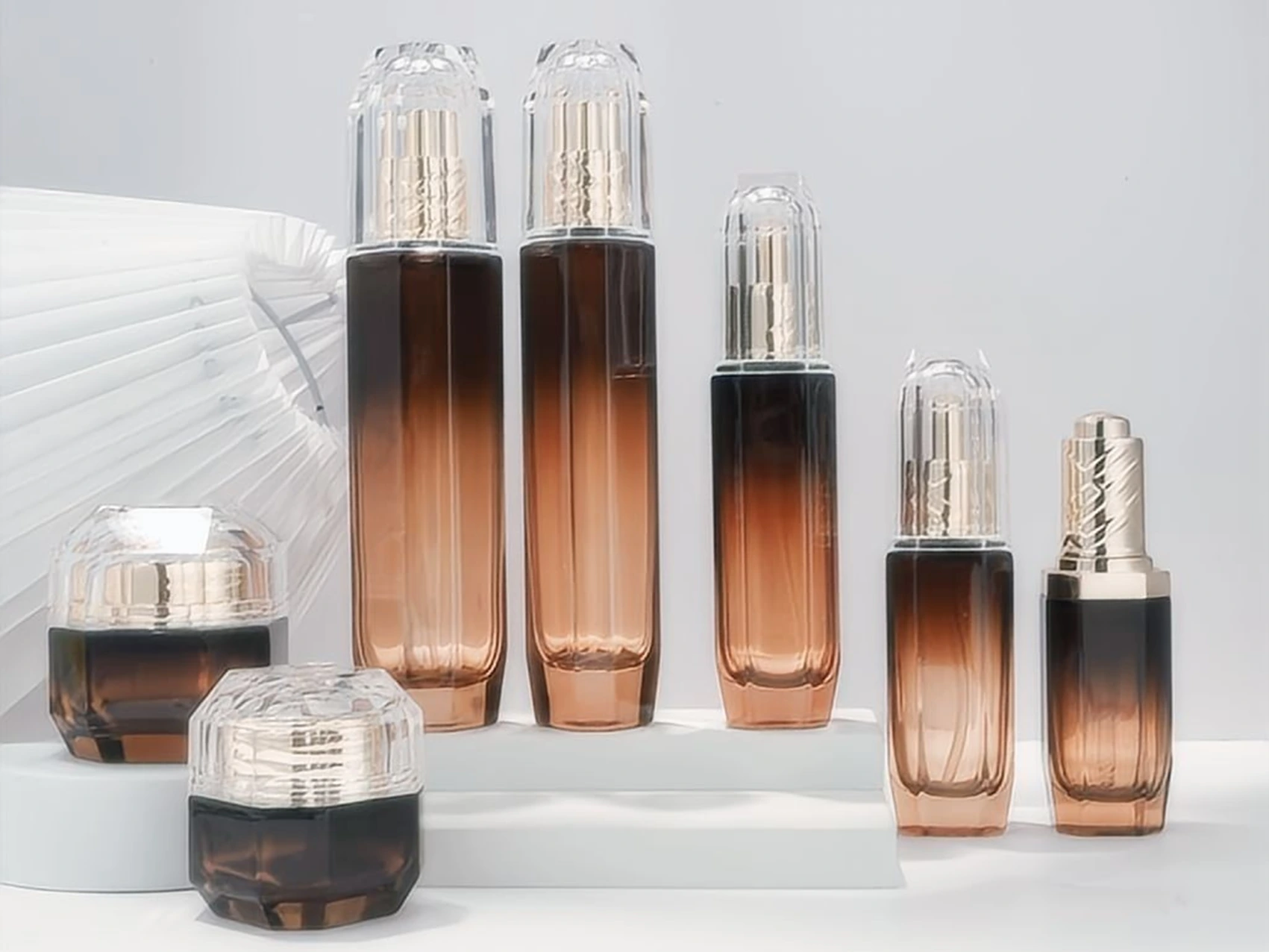 Amber Gradient Skincare Packaging Set with Faceted Crystal & Gold Caps | 110/80/60/40/30ml Bottles & 50/30g Jars for Luxury Anti-Aging Lines 1