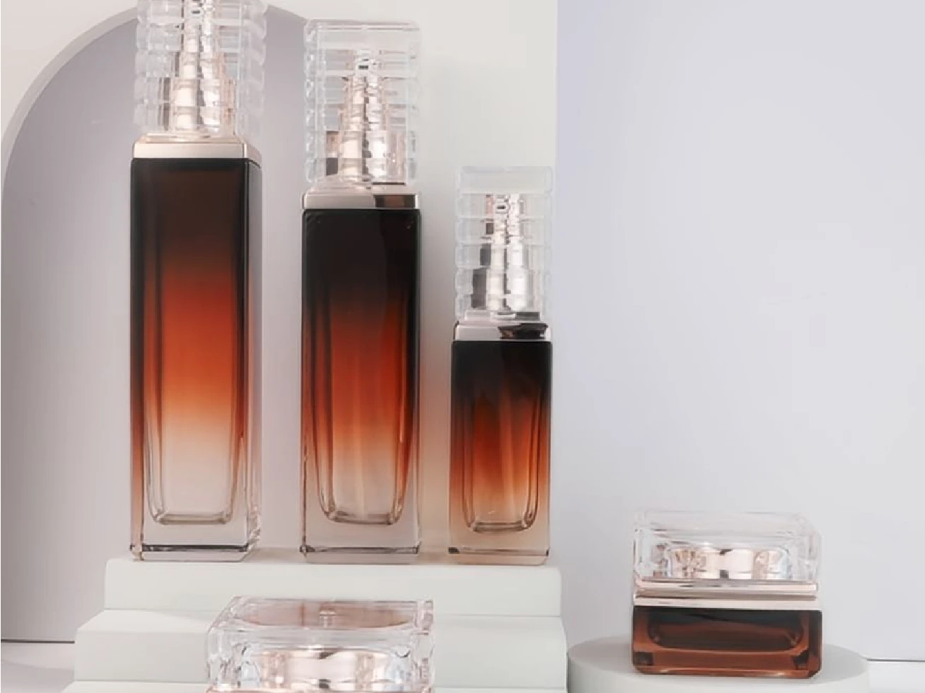 Amber Gradient Skincare Packaging Set with Faceted Crystal Caps | 120/100/40ml Bottles & 50/30g Jars for Luxury Anti-Aging Lines 1