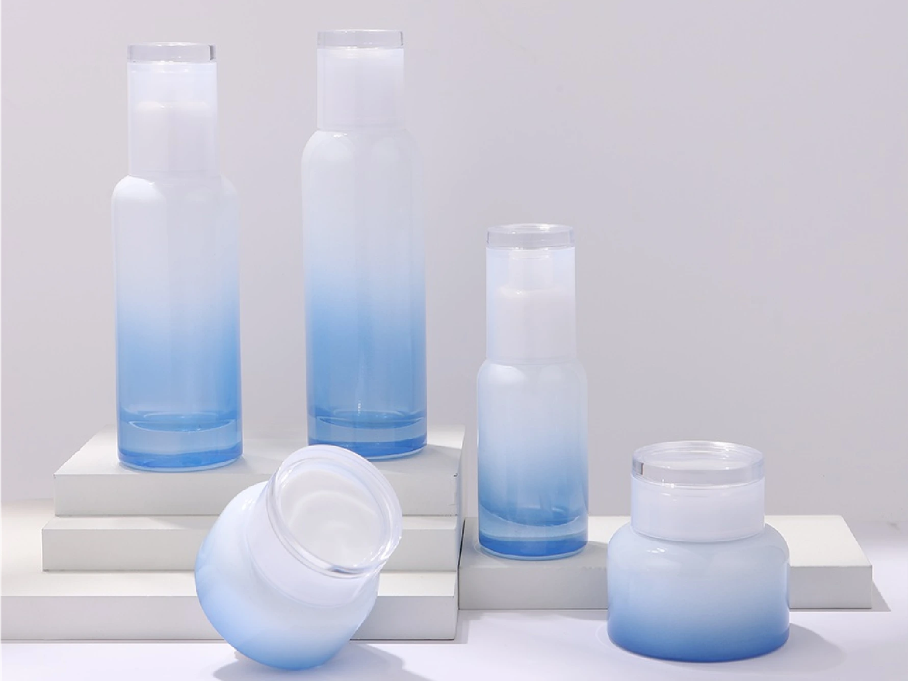 White-Blue Gradient Skincare Packaging Set with Frosted Finish | 120/100/45ml Bottles & 50/30g Jars for Refreshing Hydration Lines 1