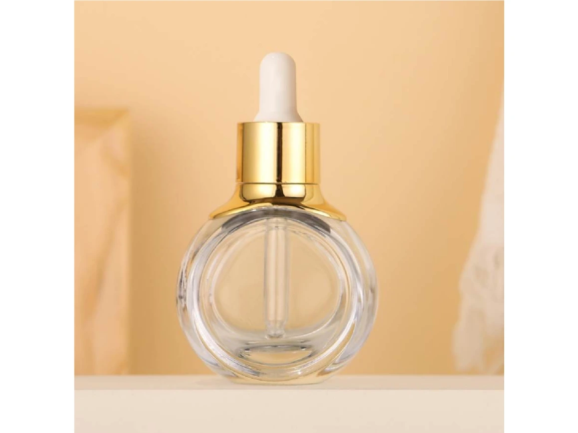 GlamorousPack Flacons compte-gouttes dorés en verre transparent de 30 ml, personnalisés pour les soins de la peau, les huiles essentielles et les sérums 1
