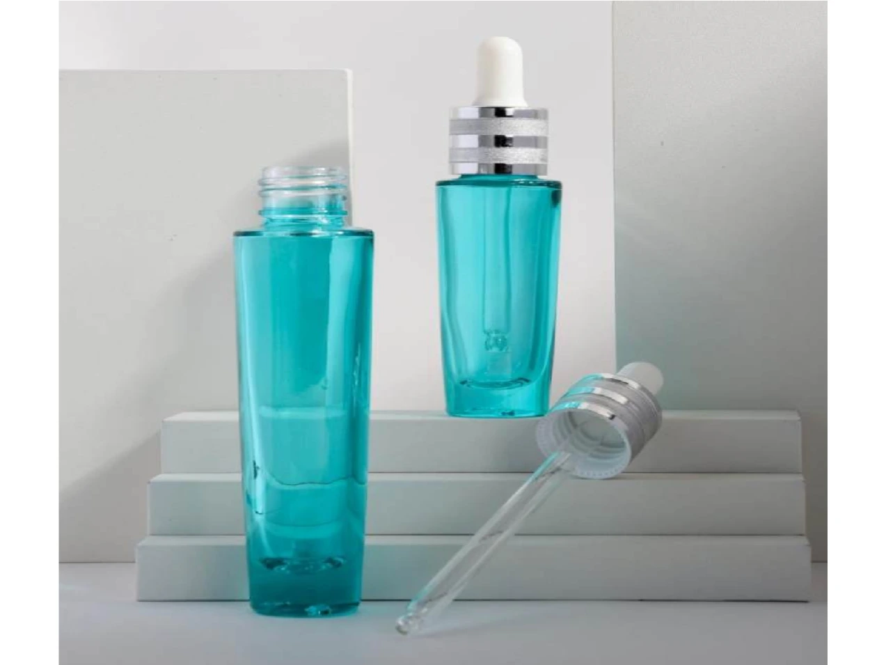 GlamorousPack 15ml 30ml Customized Transparent Blue Cosmetic Skincare Packaging Essential Oil Serum Glass Bottles 1