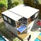 folding homes made from shipping containers in garden 4