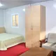 folding homes made from shipping containers in garden 8