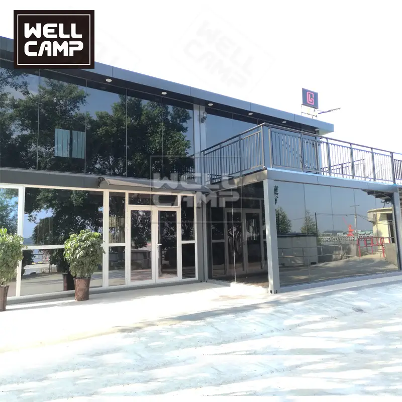 Casa contenedor de oficina de dos pisos combinada con una casa contenedor de paquete plano 1