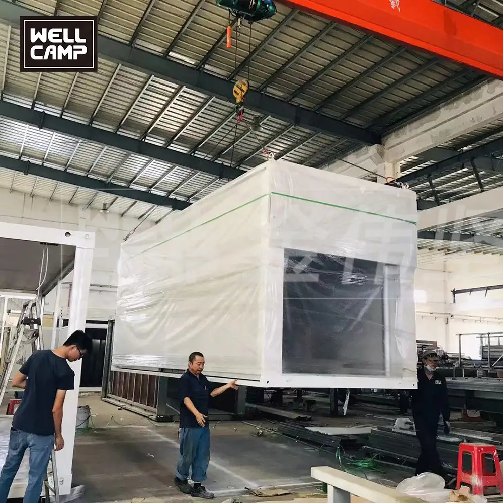 โครงสร้างเหล็กราคาโรงงานแผงแซนด์วิชบ้านสำเร็จรูปห้องเรียนตู้คอนเทนเนอร์แบบขยายได้ 1