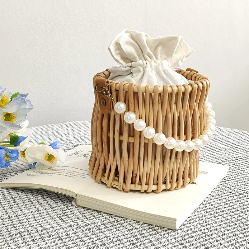 Cylindrical shape wicker handbag with pearls 1