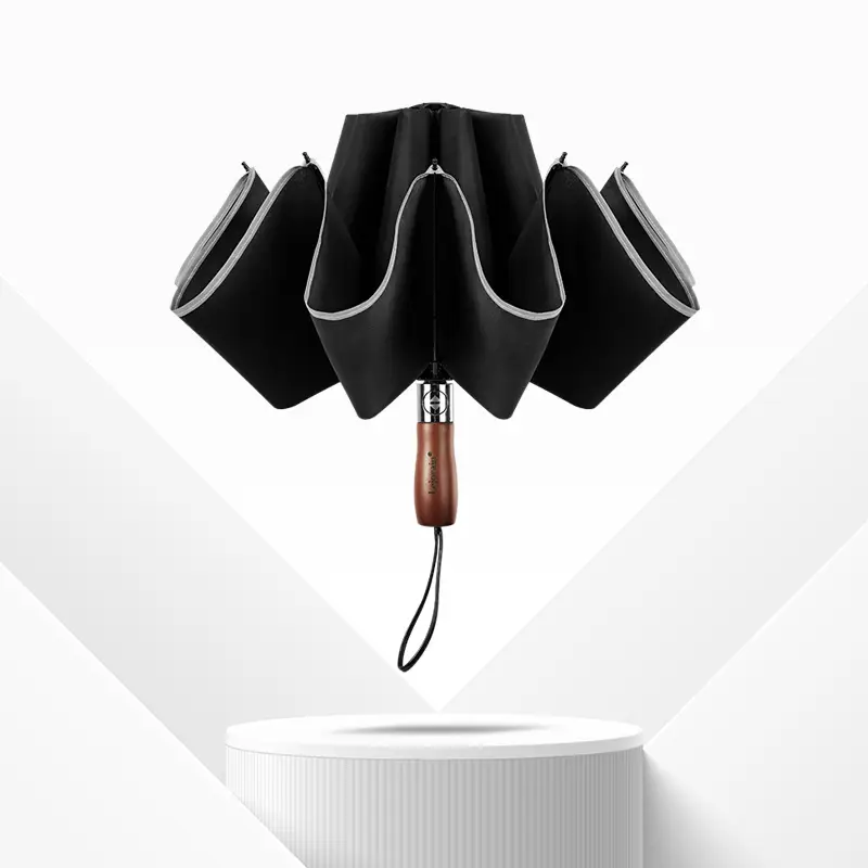 Paraguas plegable automático de 25 pulgadas con 10 varillas y logotipo personalizado, con banda reflectante de seguridad 1