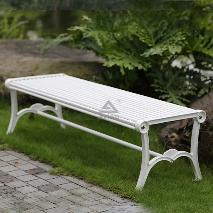 White outdoor park cast iron backless bench 1