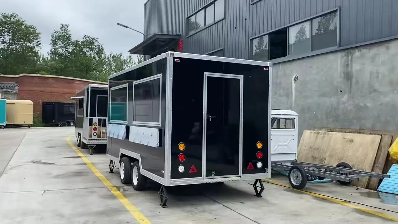 Custom Black Food Truck | Dual - Serving Windows Stainless Steel Interior Trailer Manufacturer 1