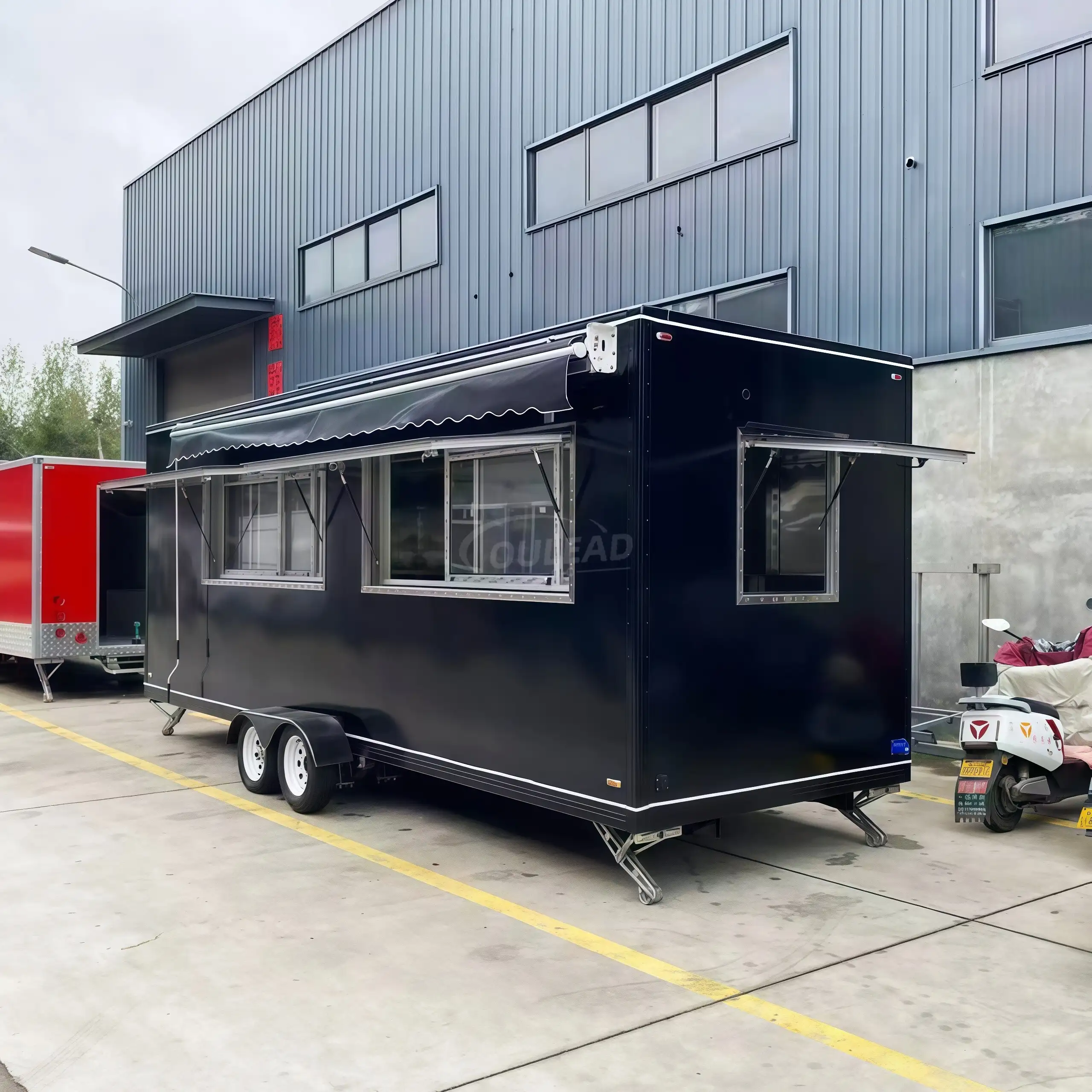 Large - Scale Black Dual - Axle Food Trailer with Multi - Window and Awning Setup 1