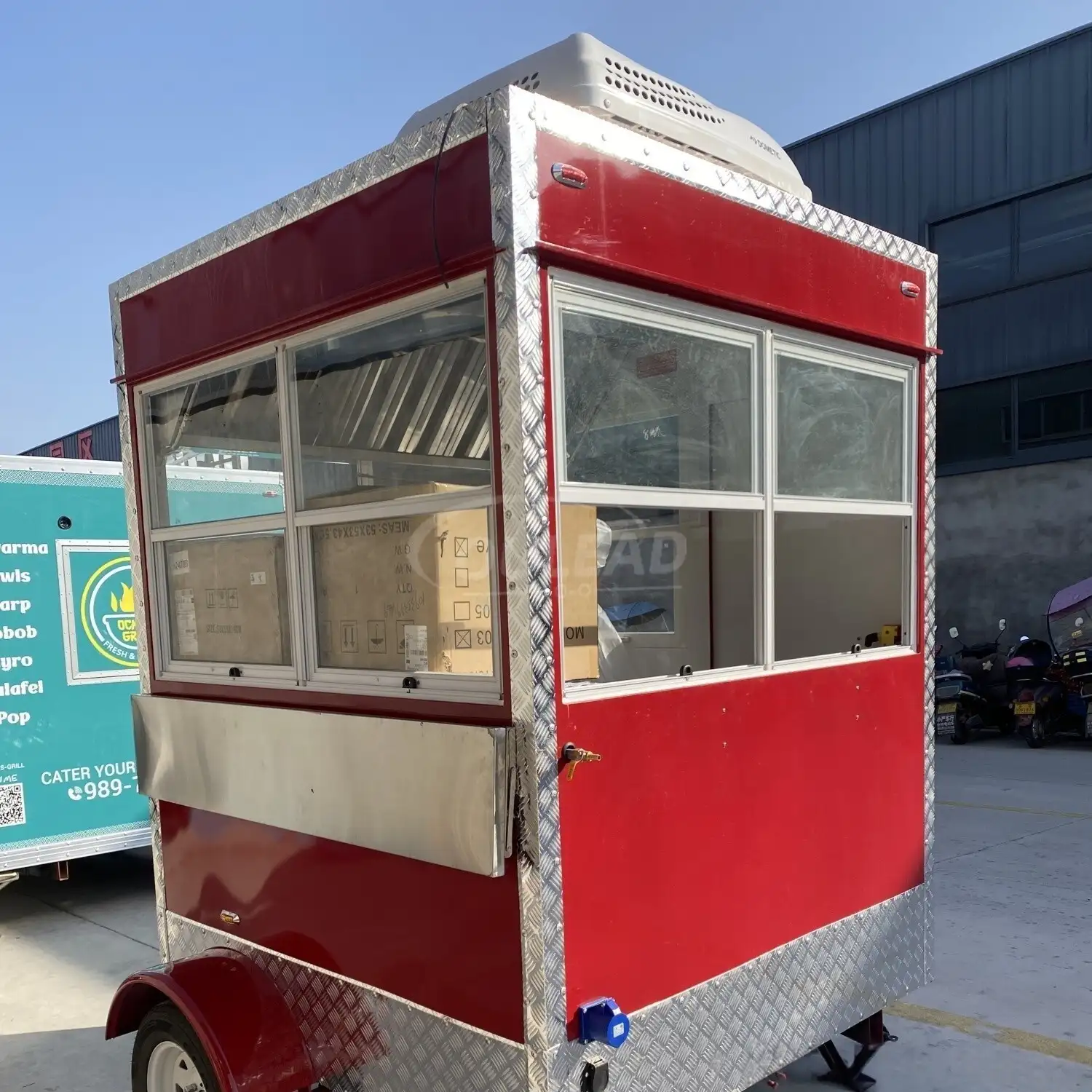 Red Single - Axle Food Trailer with Diamond Plate Accents and Large Serving Window 1