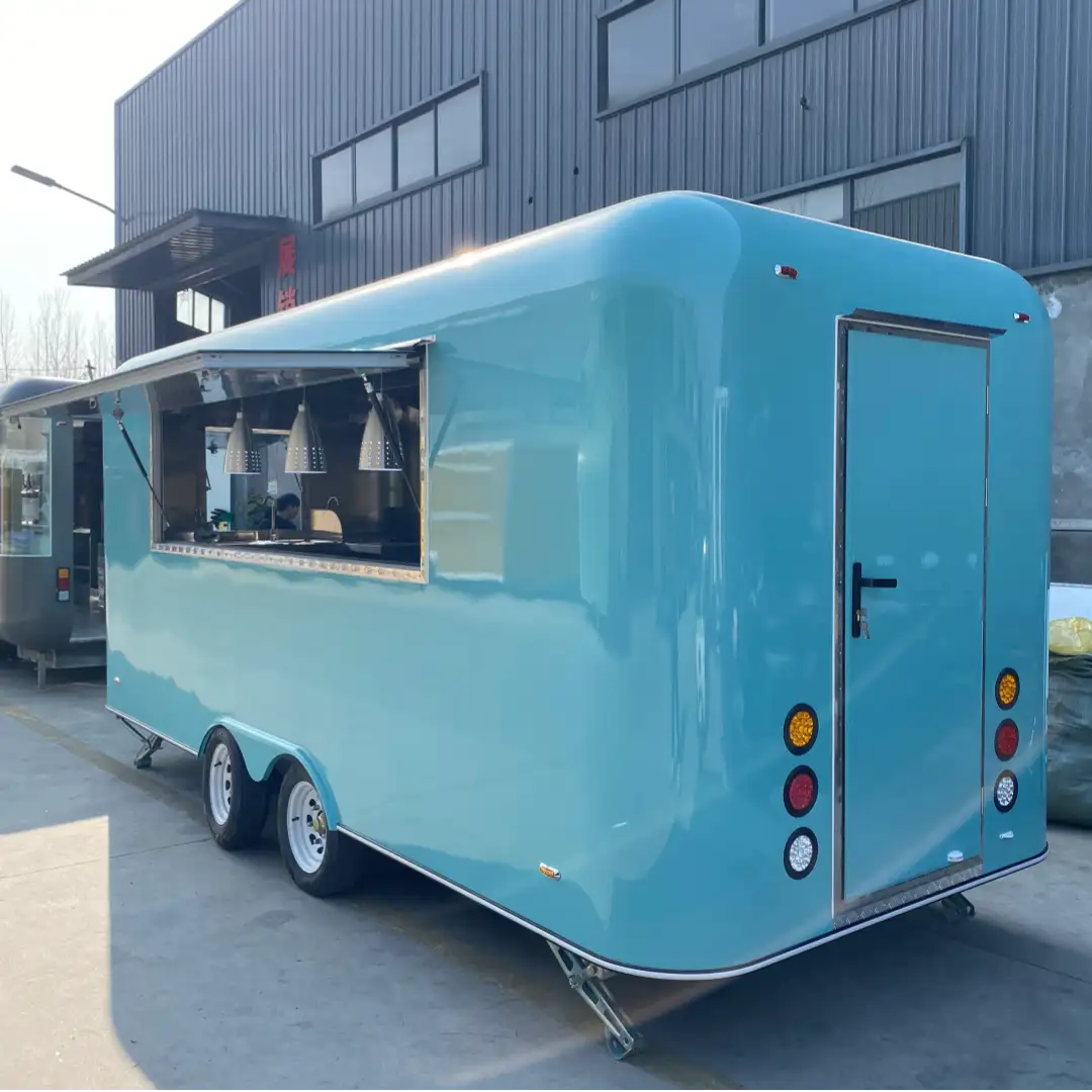 Turquoise Dual-Axle Food Trailer with Pendant-Lit Serving Station 1