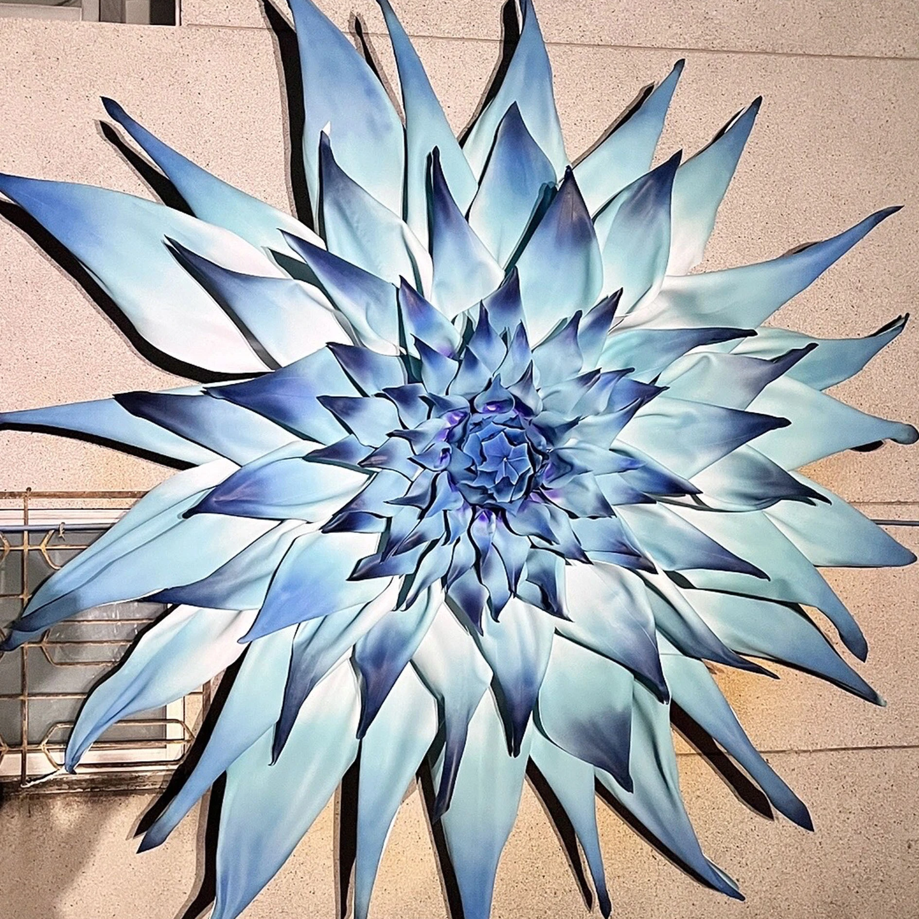 Wall-mounted giant artificial flowers