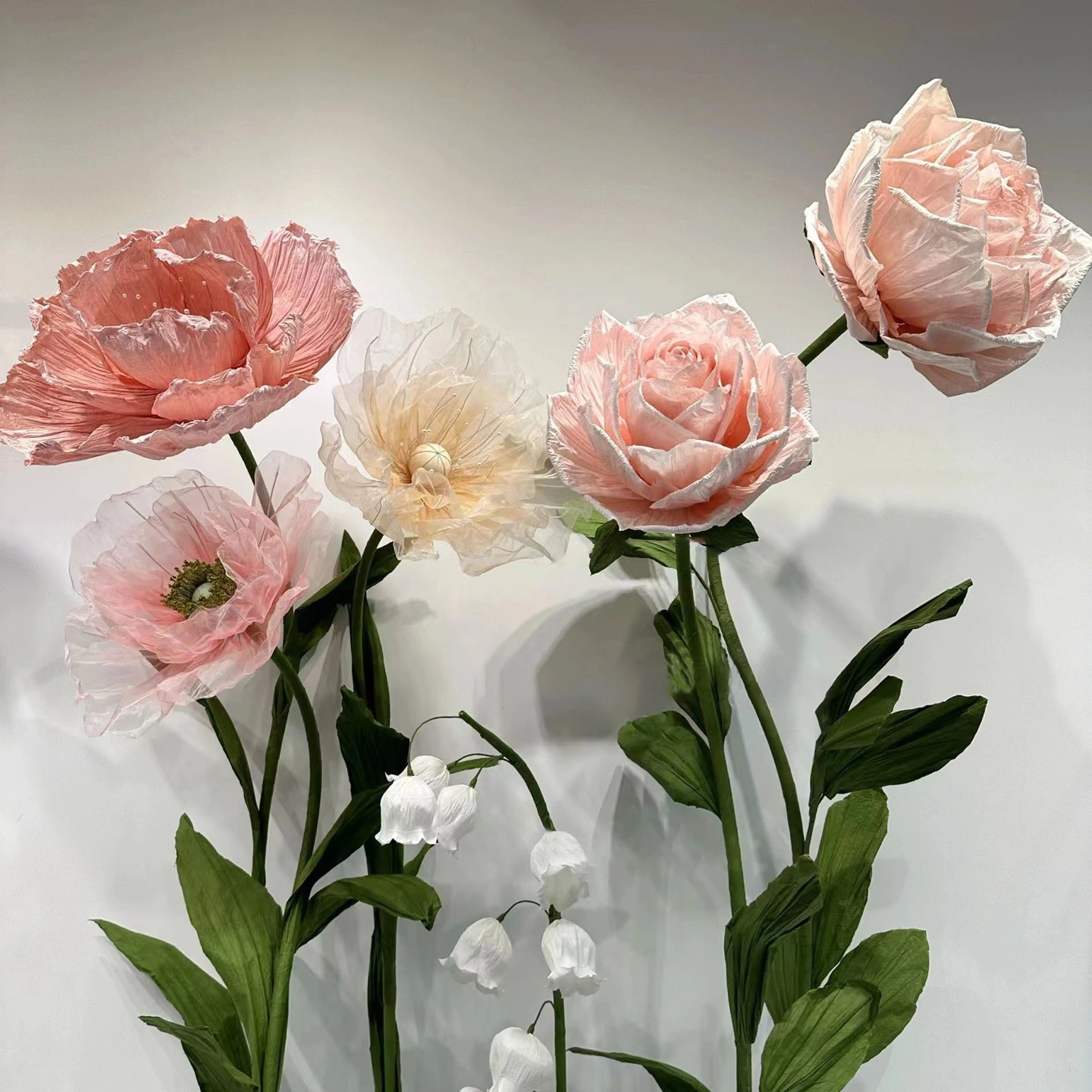 Juego de flores gigantes hechas a mano