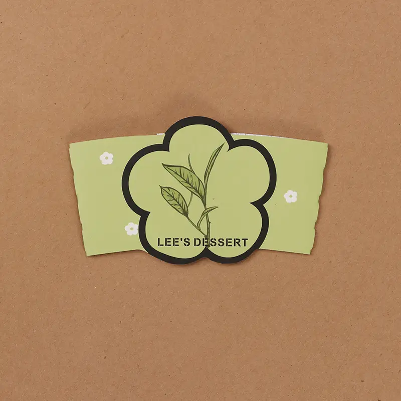 ഉച്ചമ്പക്- ഫാഷൻ കോറഗേറ്റഡ് പേപ്പർ കപ്പ് കവർ കോഫി കപ്പ് ജാക്കറ്റ് ഹോട്ട് ഡ്രിങ്ക് കപ്പ് സ്ലീവ് കസ്റ്റം ലോഗോ സ്വീകരിക്കുക കപ്പ് സ്ലീവ് 1