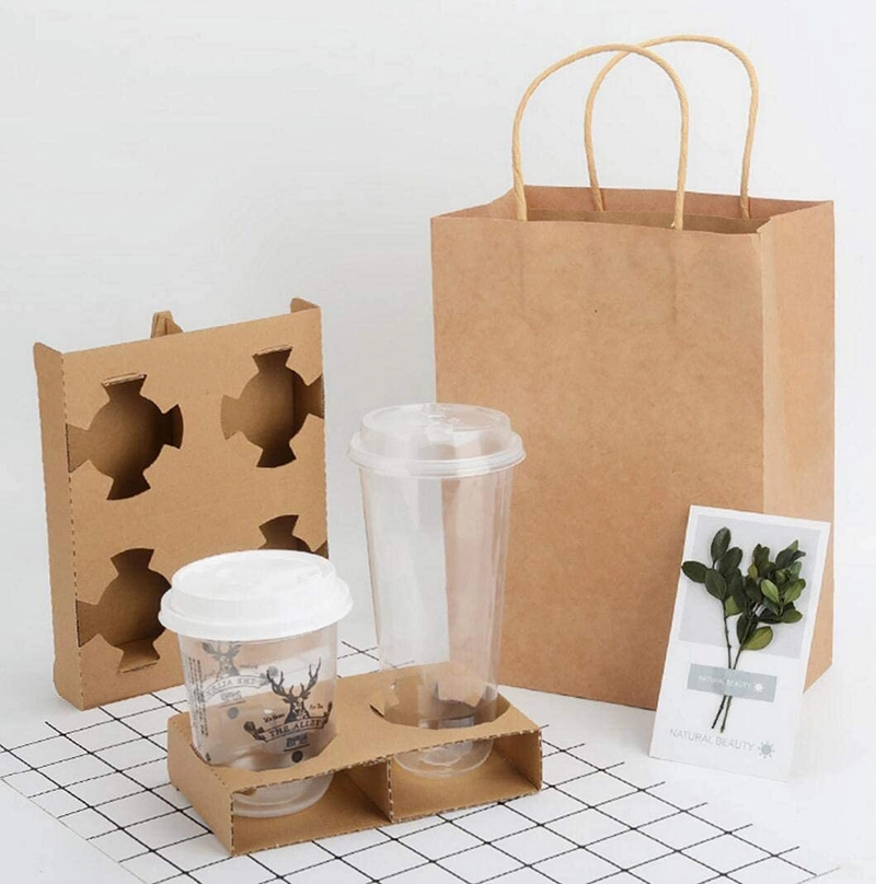 Uchampak- Eco-friendly Factory Custom Coffee Carrier Cup Holder Corrugated Paper Kraft Paper Cup Holder 1