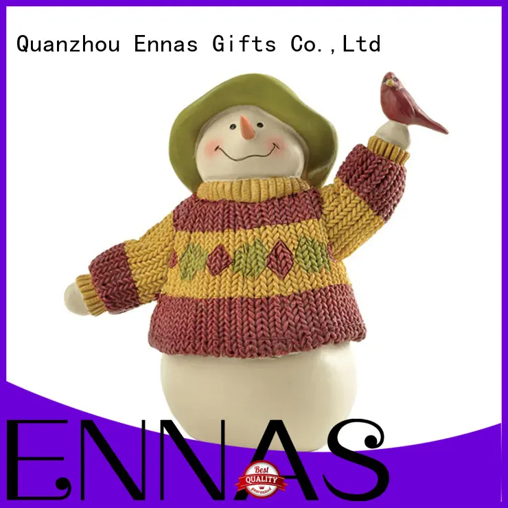 Holding a Red Bird Snowman Figurine 1