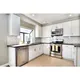 New white gloss laminate kitchen cabinets manufacturers 2