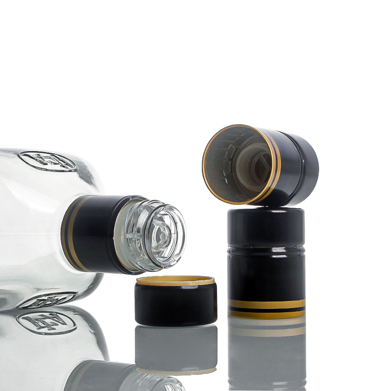 Theko ea feme e rekisoang e chesang 33*47 Tequila Aluminium Plastic Non-refillable Spirits Vodka Whisky Bottle Cap Closures 1