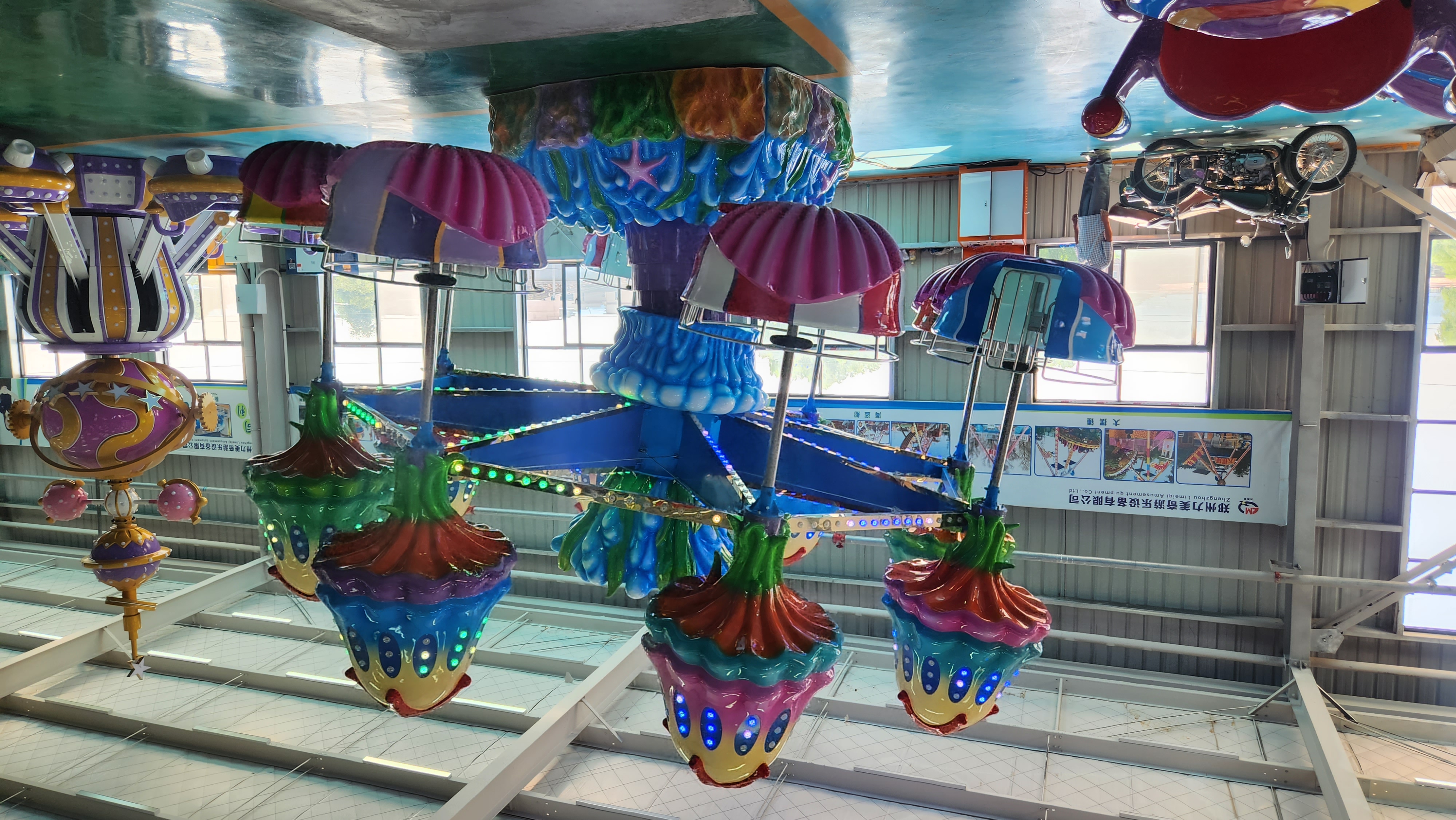 Kid Riding A Shell Colorful Rotating Leisure Jellyfish Ride with Shell-Shaped Cabins | LIMEIQI