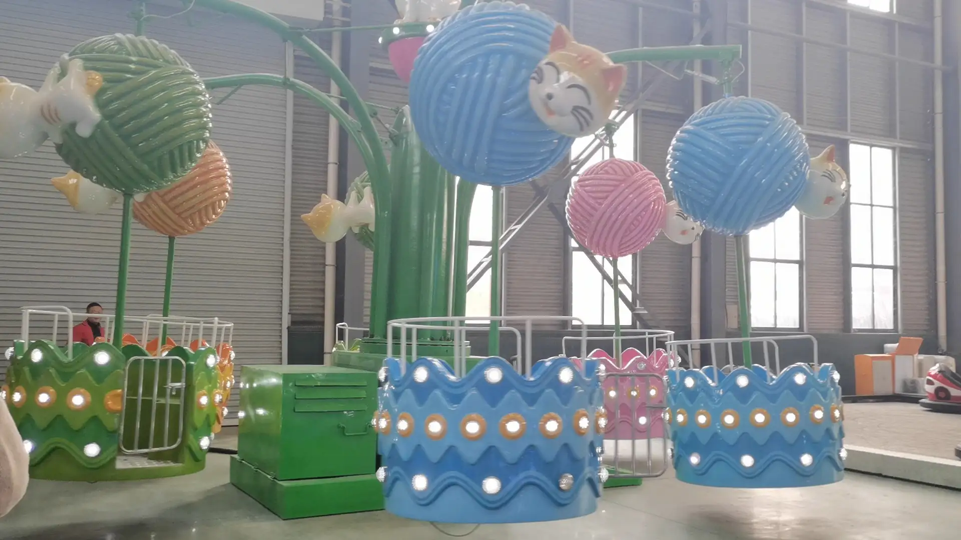 Cat - Themed Amusement Ride: Yarn Ball and Cat - Styled, Rotating Fun with Vibrant Colors 1