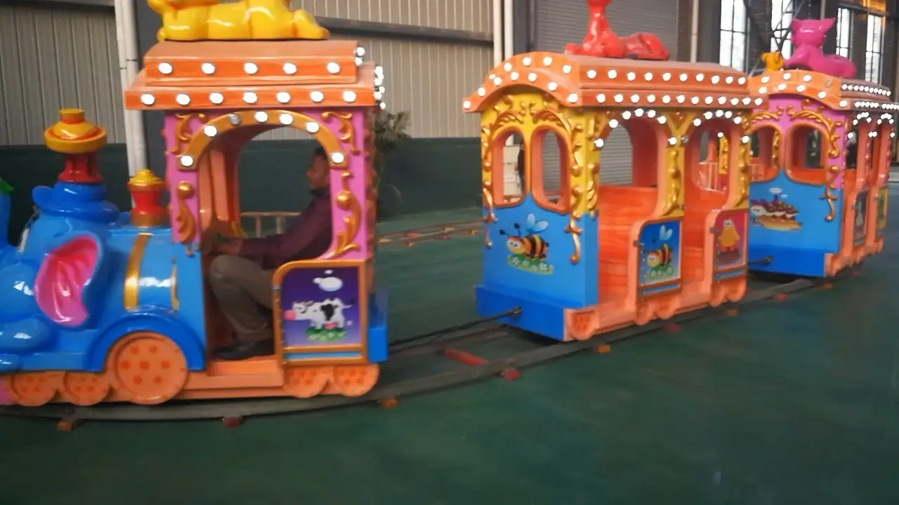 Elephant - Themed Train Amusement Ride: Colorful and Kid - Friendly Track Adventure 1
