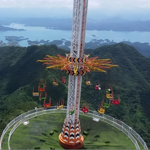 High-Flying Amusement Park Ride with Towering Arm and Vibrant Seats ...