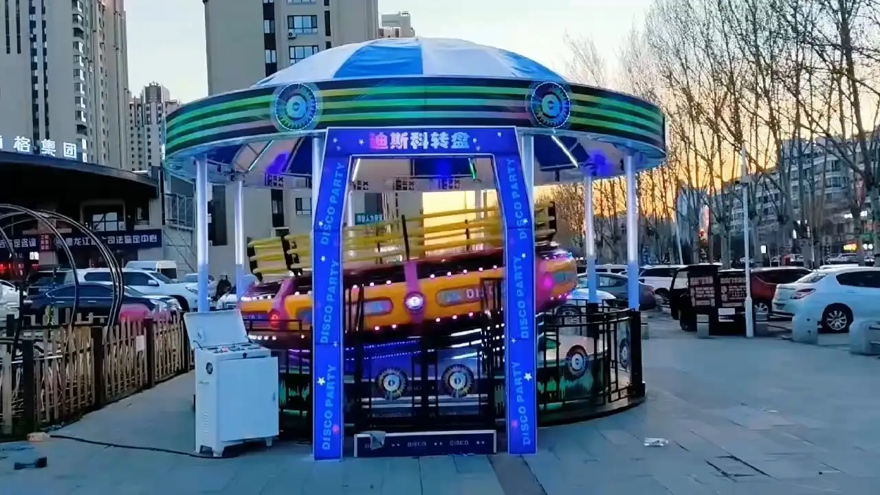 Disco Tagada ride operating in theme park