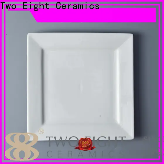 Two Eight white porcelain plates company for dinner 1