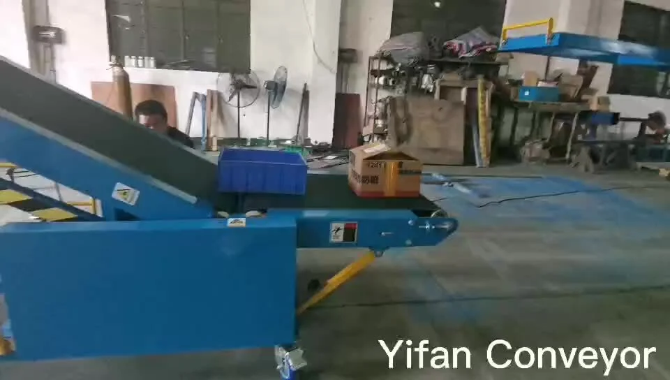 Inclined truck loading and unloading conveyor for vehicle unloading1 1