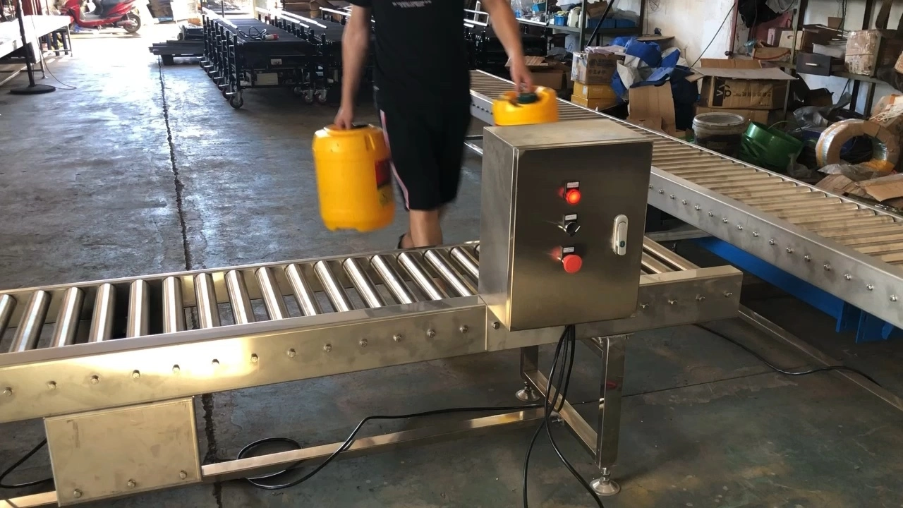 Customized stainless steel 201,304 roller conveyor table 1