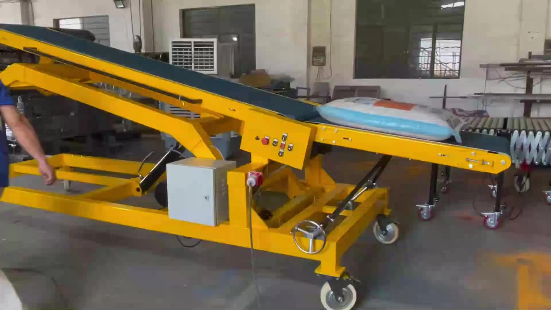 Truck loading conveyor with scale and routing sensors 1