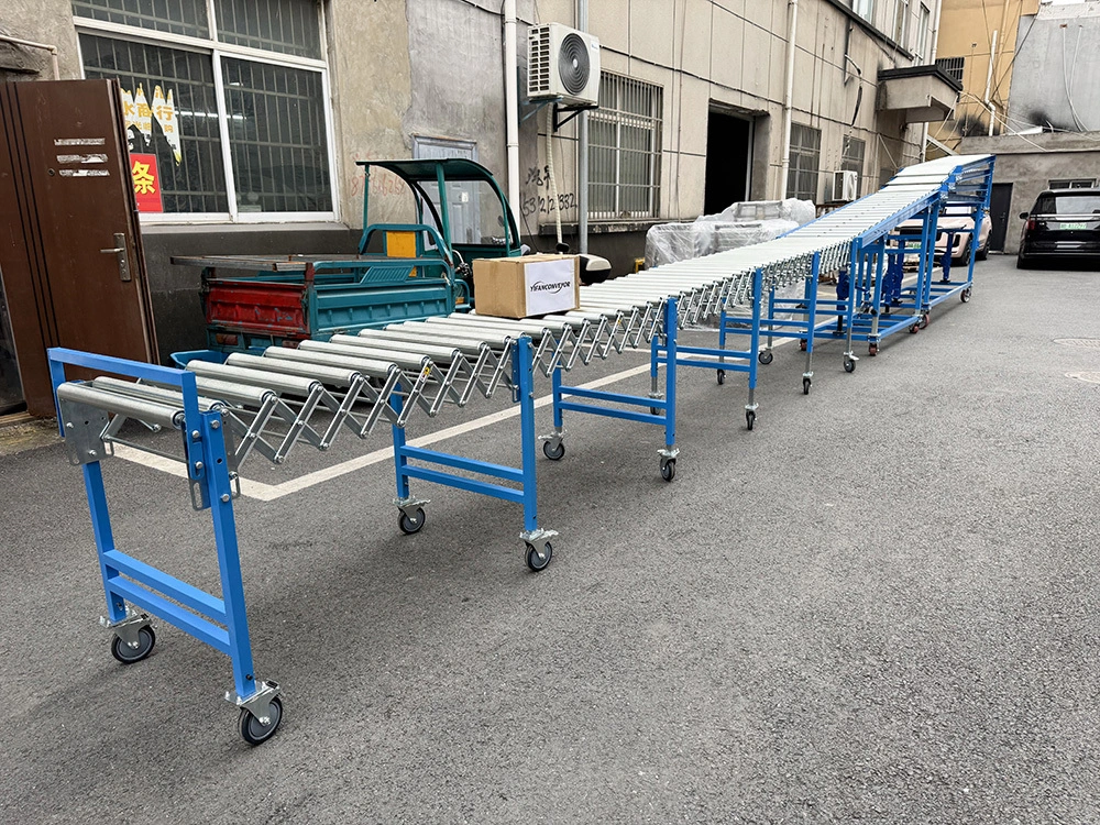 Transportador de rodillos de descarga por gravedad telescópico para cajas/cartones 1
