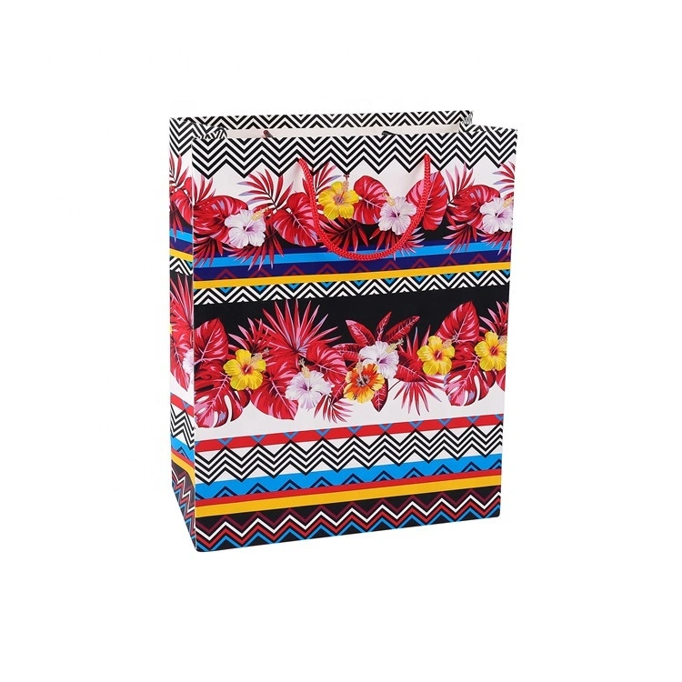 Sacchetto regalo di carta con foglie di fiori colorati a forma d'onda con manico rosso 1
