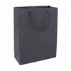 Los fabricantes personalizaron la bolsa de regalo de papel revestido mediana con asa 1