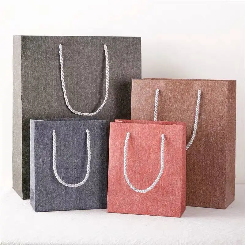 Customize simulation cloth texture paper gift bag for clothing shopping 1