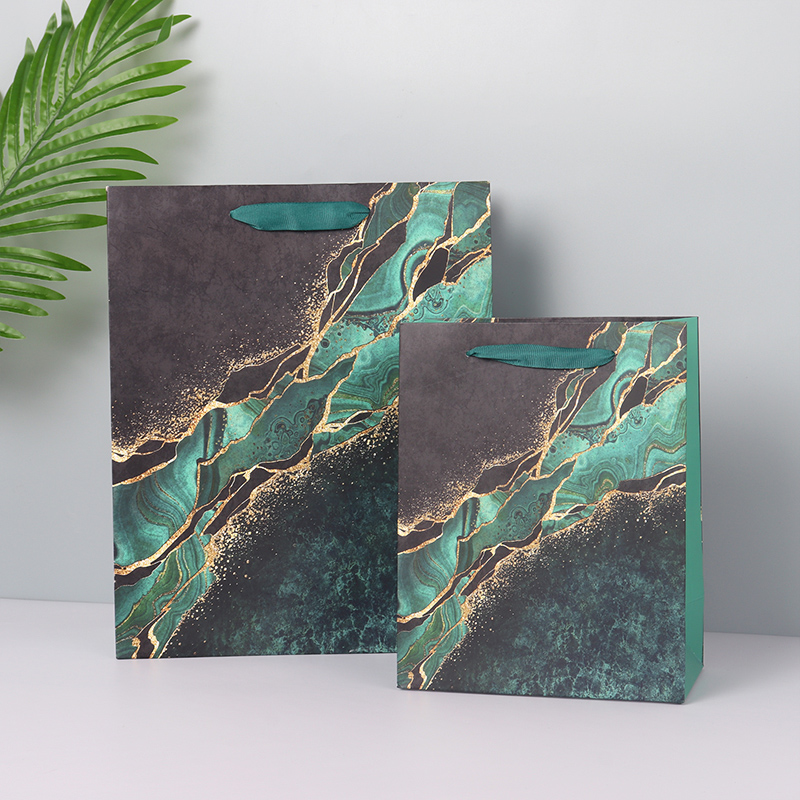 green paper shopping bags