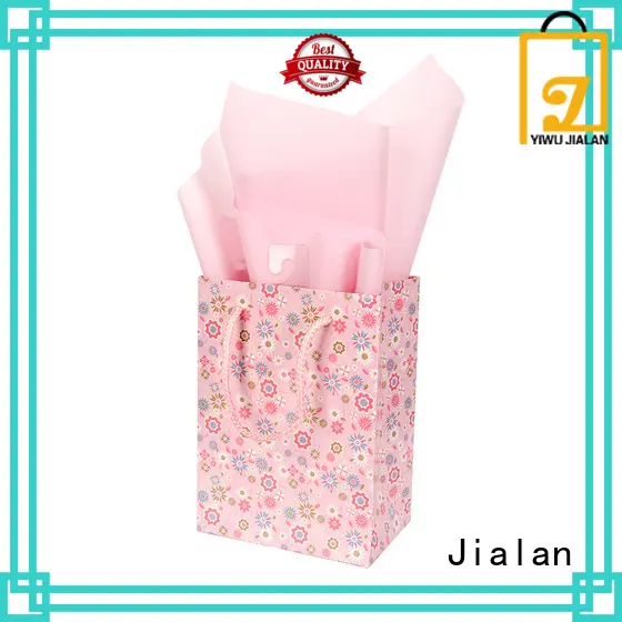 Bolsas de papel personalizadas que ahorran costes y son óptimas para envolver regalos. 1
