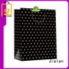 Bolsas de papel artesanales personalizadas ideales para tiendas de ropa. 1