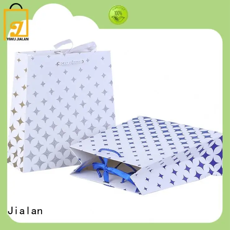 Exquisitas bolsas de regalo de papel al por mayor para embalaje de regalos navideños. 1