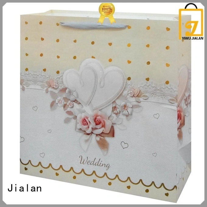 Jialan Proveedor de bolsas de papel que ahorra costos para empacar regalos 1