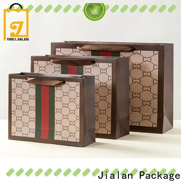 Jialan Paquete de bolsas de regalo baratas al por mayor para embalaje de regalos navideños 1