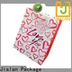 Pequeña empresa de bolsas de papel navideñas para empacar regalos de cumpleaños. 1