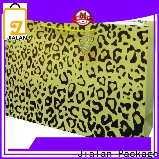 Fabricante de pequeñas bolsas de papel personalizadas para embalaje de regalos navideños. 1