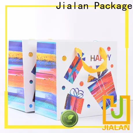 Jialan Paquete de fábrica de bolsas de papel impresas para embalaje de regalos navideños 1