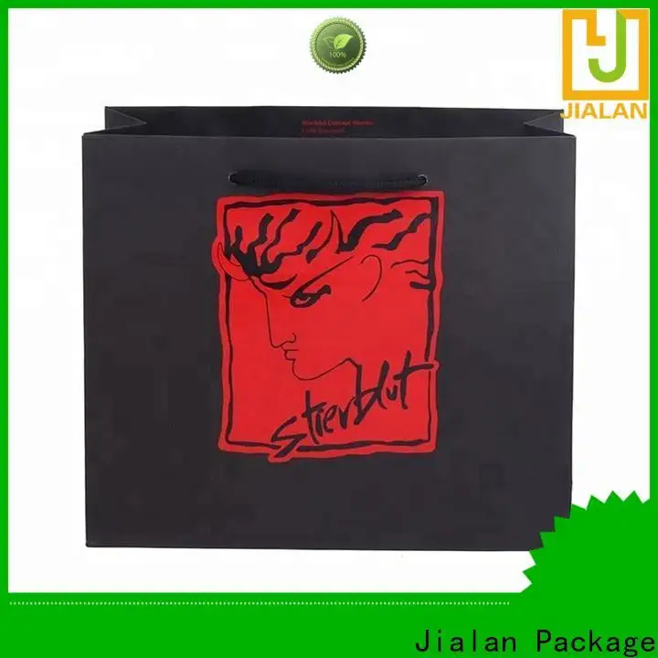 Suministro de bolsas de papel publicitarias para promoción. 1