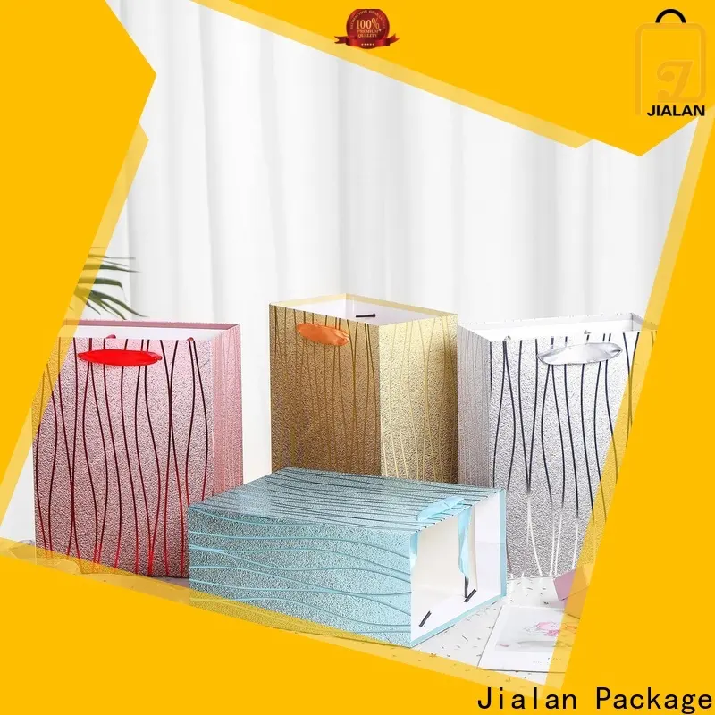 Jialan Paquete de bolsas de regalo marrones al mejor precio con asas a la venta para embalaje de regalos navideños 1