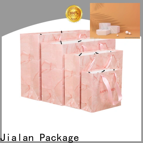 Jialan Paquete de fábrica de bolsas de papel personalizadas baratas para embalaje de regalos navideños 1